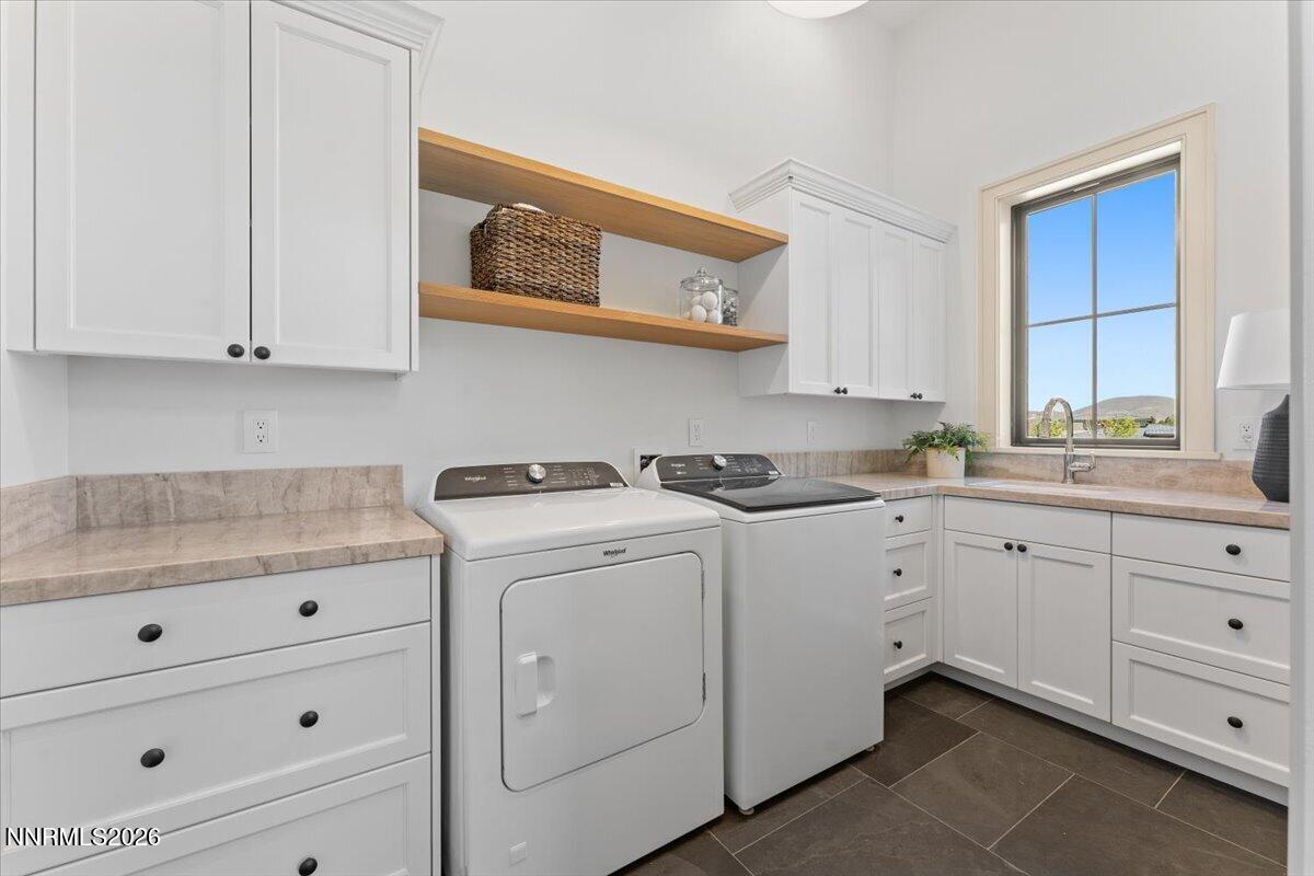 11 Glenhaven Drive Reno, NV 89511 - Photo 48 of 51 a kitchen with cabinets appliances a sink and a window
