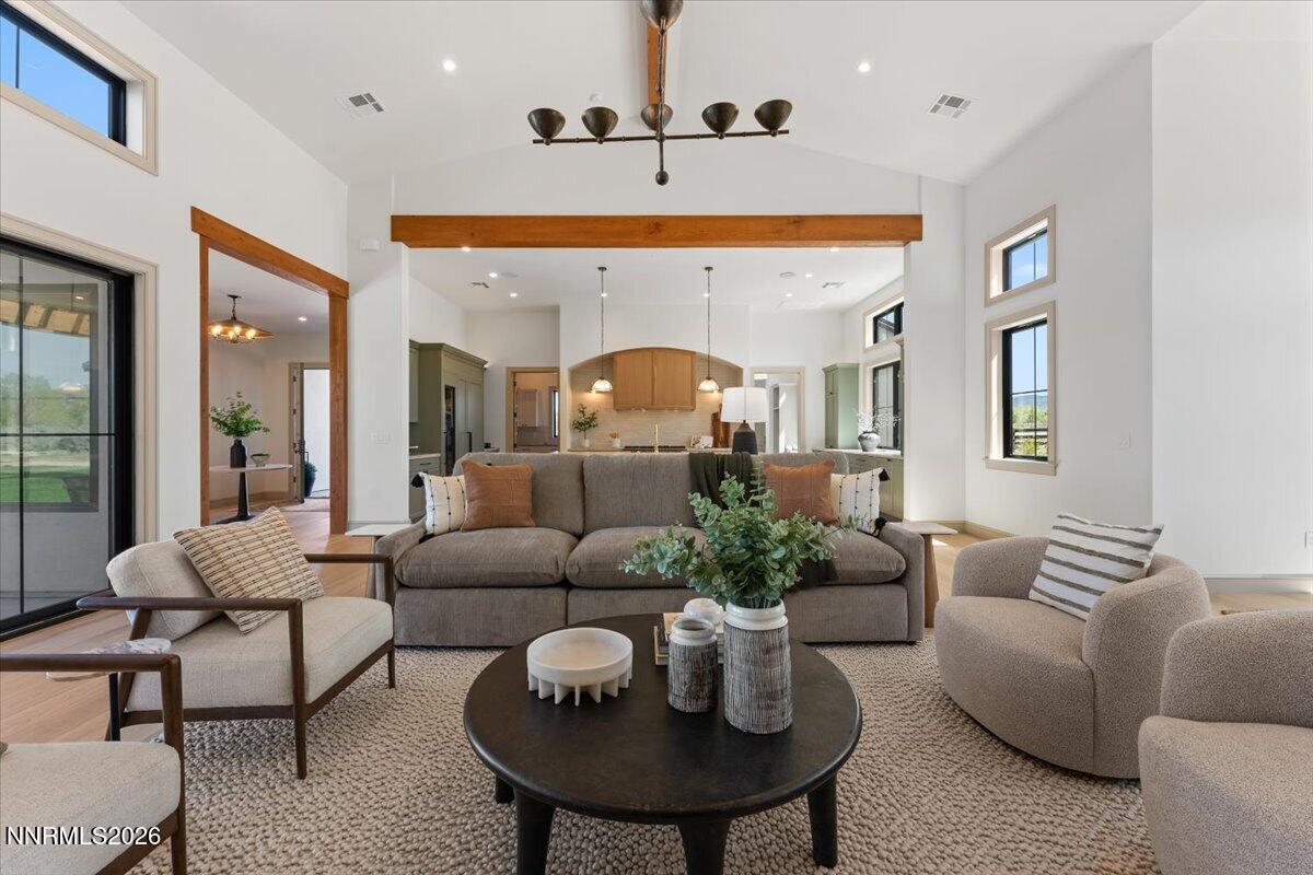 11 Glenhaven Drive Reno, NV 89511 - Photo 6 of 51 a living room with furniture potted plant and a large window