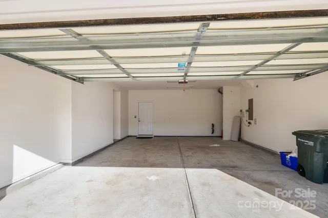 a view of a pathway both side of the house