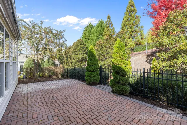 a view of a brick house with a large window