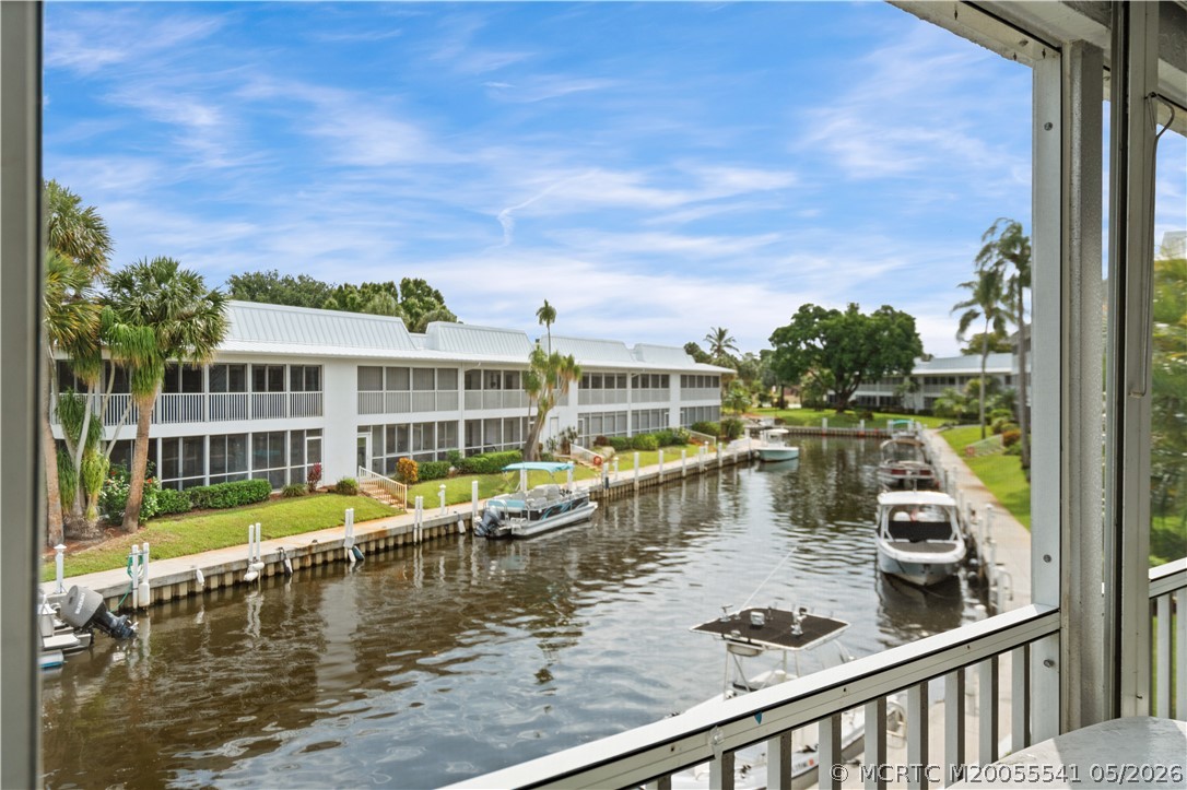 1866 Southwest Palm City Road, Unit 204 Stuart, FL 34994 - Photo 5 of 38 Canal view from porch