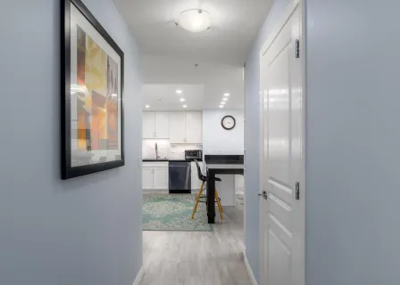 a bedroom with a bed and a bookshelf