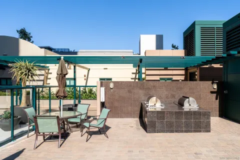 a view of a swimming pool with chairs