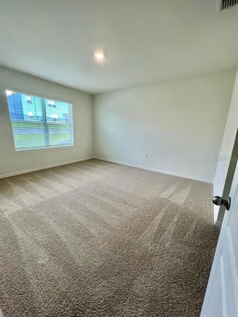en empty room with windows