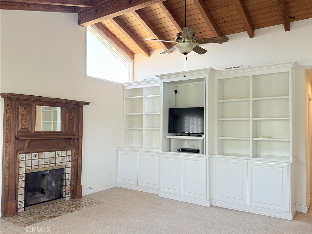 11682 Harrisburg Road Los Alamitos, CA 90720 - Photo 16 of 23 a view of a livingroom with furniture and flat screen tv