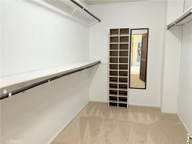 a view of a swimming pool with a yard