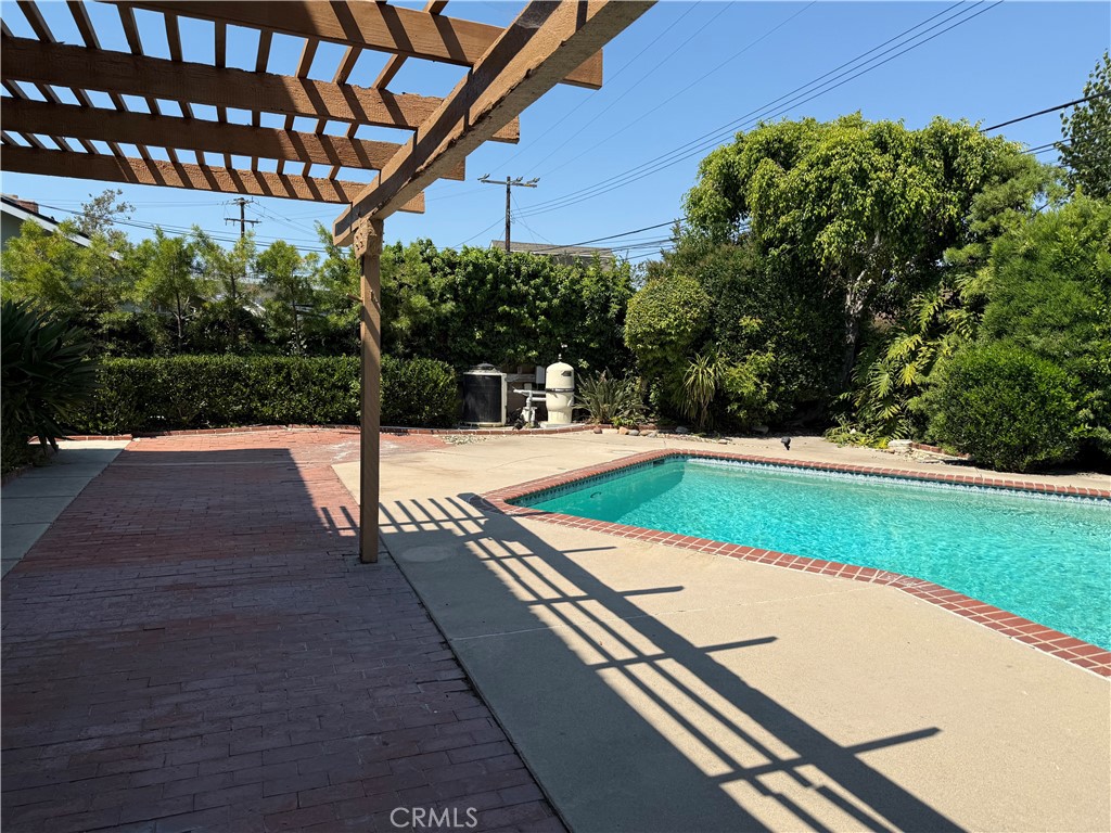 11682 Harrisburg Road Los Alamitos, CA 90720 - Photo 21 of 23 a view of a swimming pool with a patio