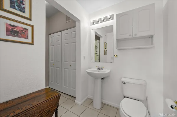 a bathroom with a sink and toilet
