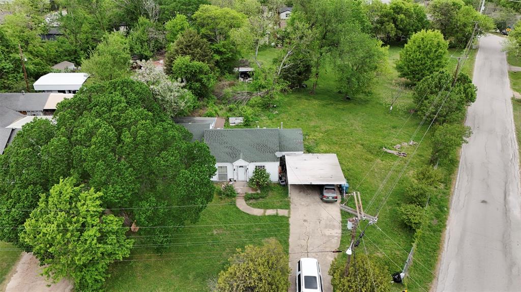 243 Walnut Street Wilmer, TX 75172 - Photo 11 of 20 an aerial view of a house with a yard
