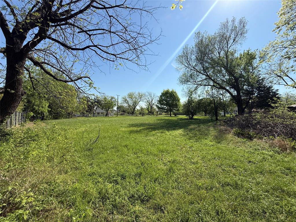 243 Walnut Street Wilmer, TX 75172 - Photo 15 of 20 a view of yard with green space