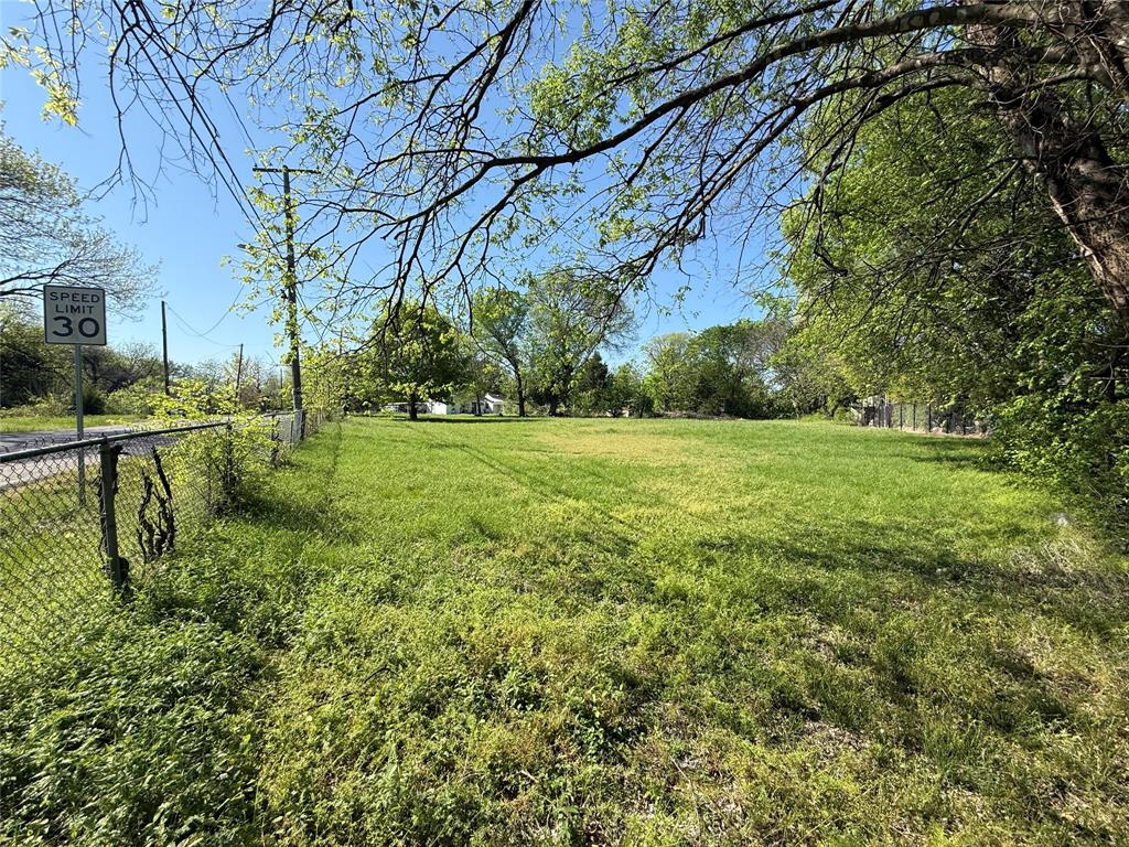 243 Walnut Street Wilmer, TX 75172 - Photo 19 of 20 a view of a park with large trees