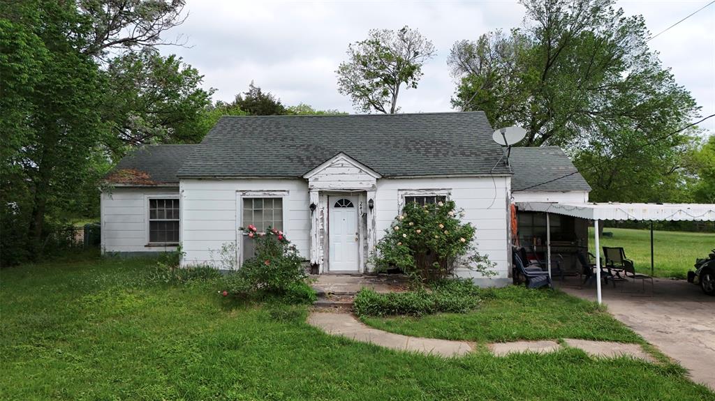 243 Walnut Street Wilmer, TX 75172 - Photo 5 of 20 a view of a house with backyard and garden