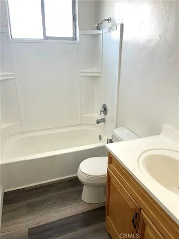 a view of a swimming pool with some plants