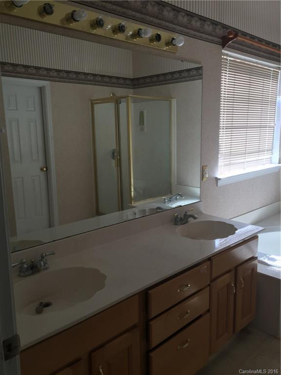12232 Old Timber Road Charlotte, NC 28269 - Photo 15 of 15 a close up of a toilet