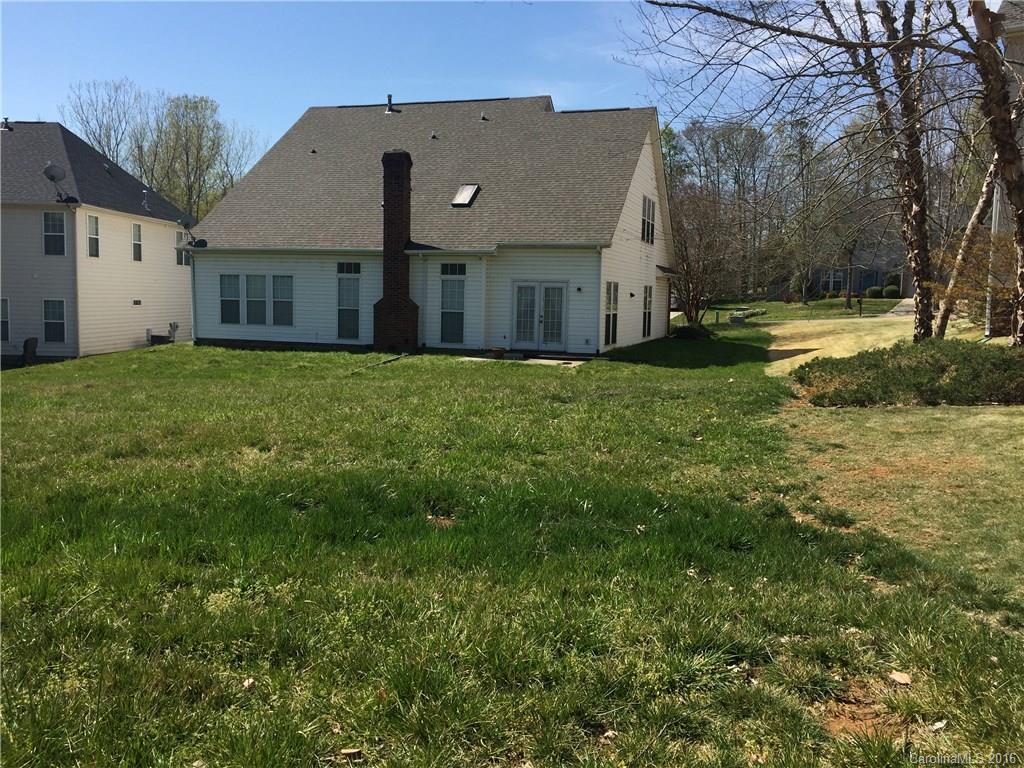 12232 Old Timber Road Charlotte, NC 28269 - Photo 3 of 15 a view of a house with backyard and garden