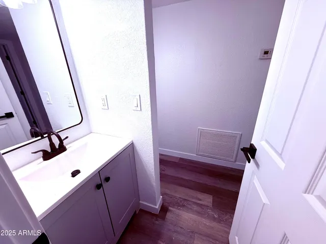 a bathroom with a toilet and a sink