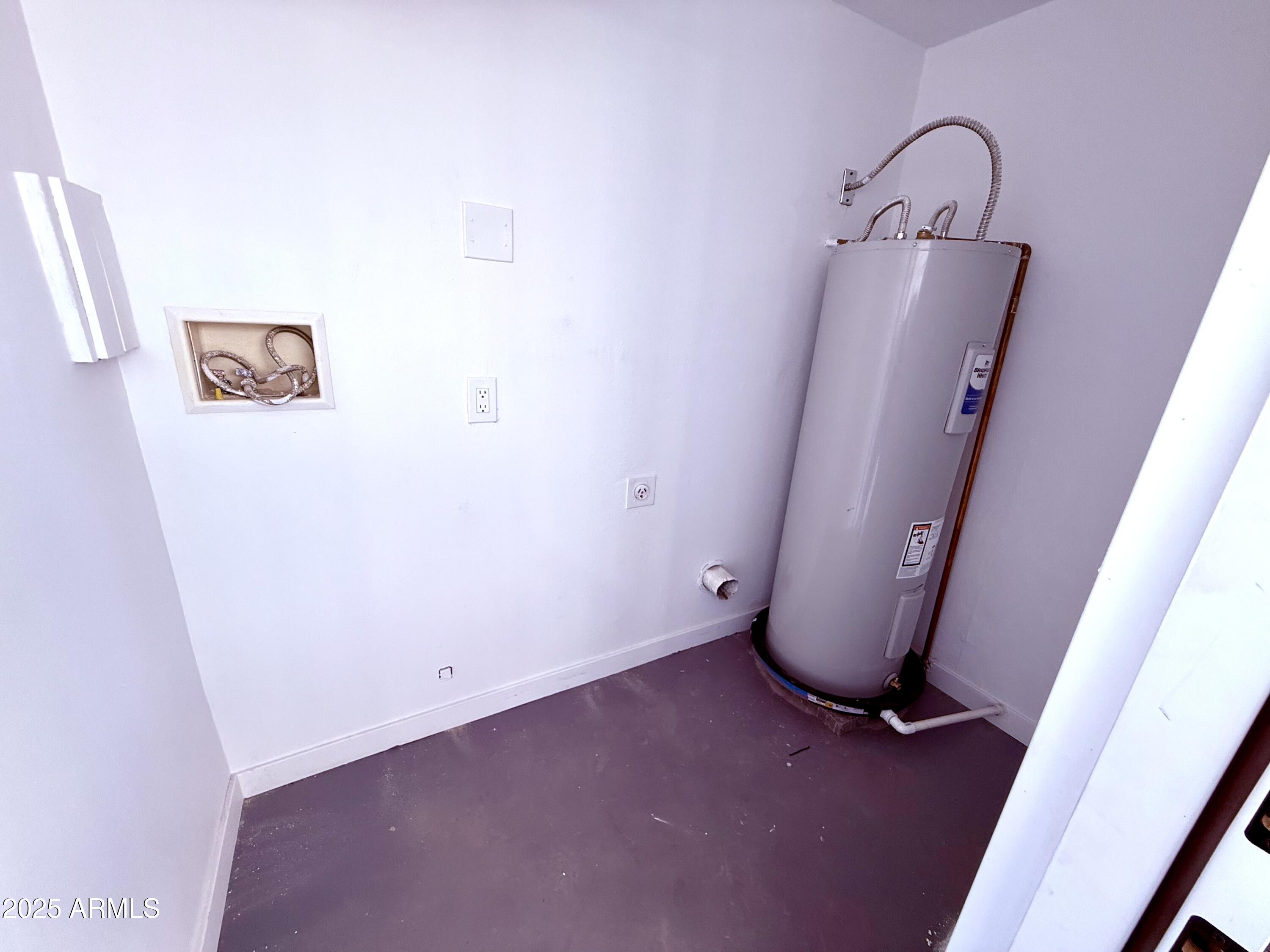 1009 East Chipman Road Phoenix, AZ 85040 - Photo 29 of 30 a view of a storage and utility room with a sink
