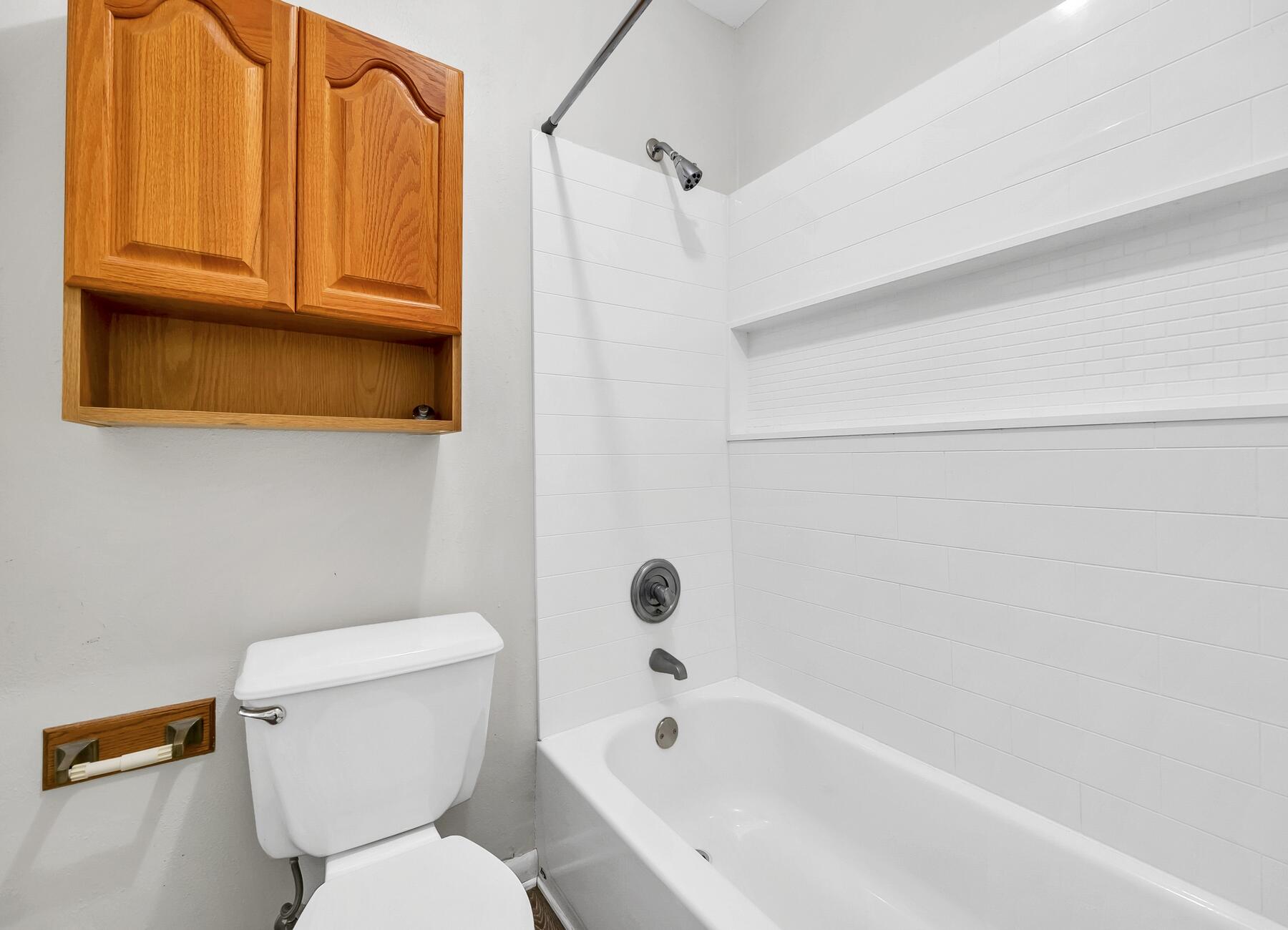 16 Gardner Drive Shalimar, FL 32579 - Photo 34 of 45 a bathroom with a toilet and a bathtub