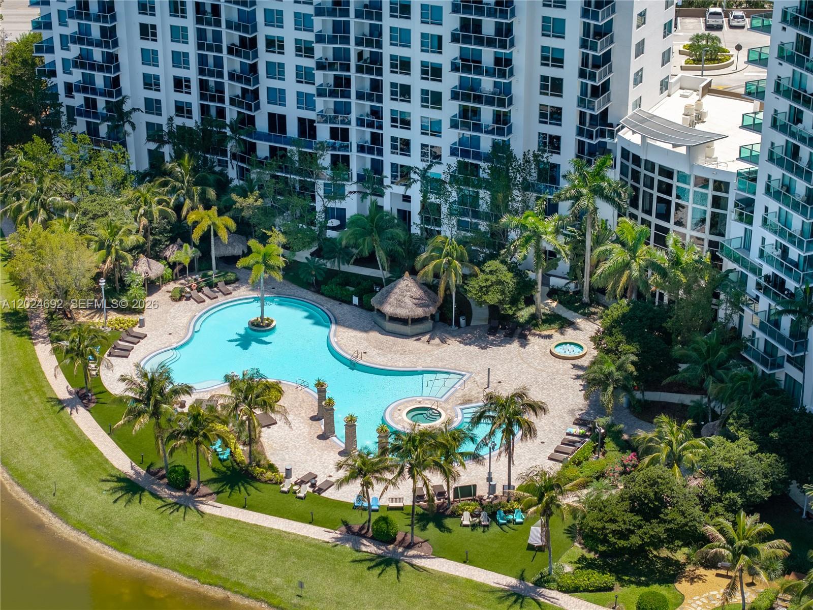 2641 North Flamingo Road, Unit 2605N Sunrise, FL 33323 - Photo 44 of 56 a view of a garden with flowers