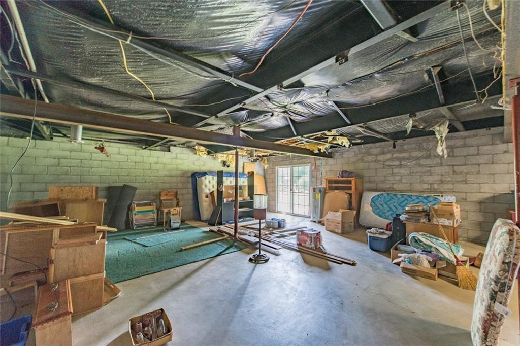 747 Beaver Road Greensburg, PA 15601 - Photo 19 of 24 The basement has high ceilings and a walk-out. It could easily be finished. There is a Pittsburgh toilet in the corner and it is plumbed for a bath to be added.