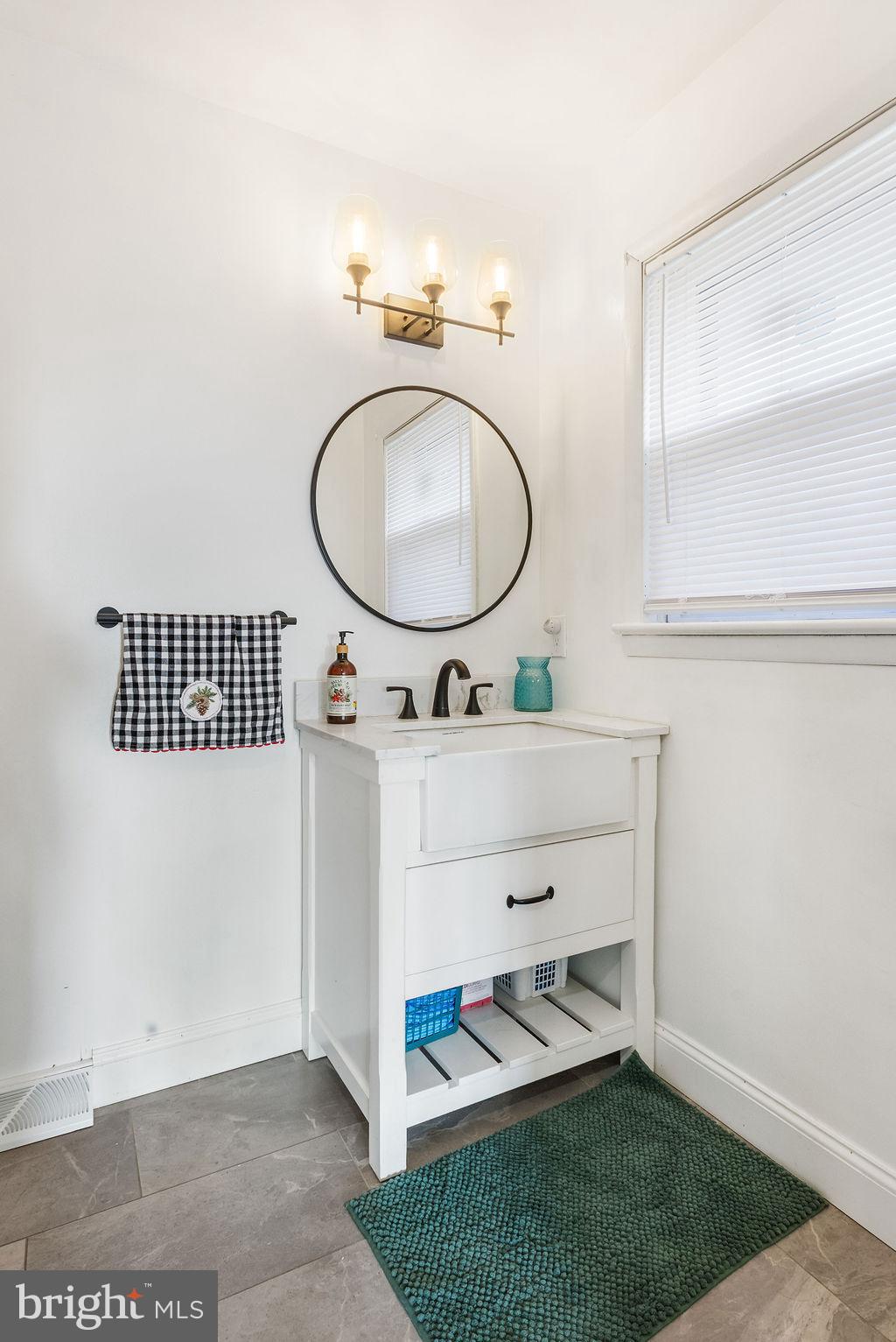 2276 Ridge Road York, PA 17406 - Photo 11 of 34 a bathroom with a sink and a mirror