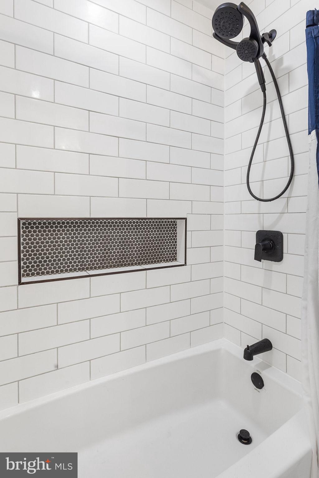 2276 Ridge Road York, PA 17406 - Photo 12 of 34 a bathroom with a bathtub and shower