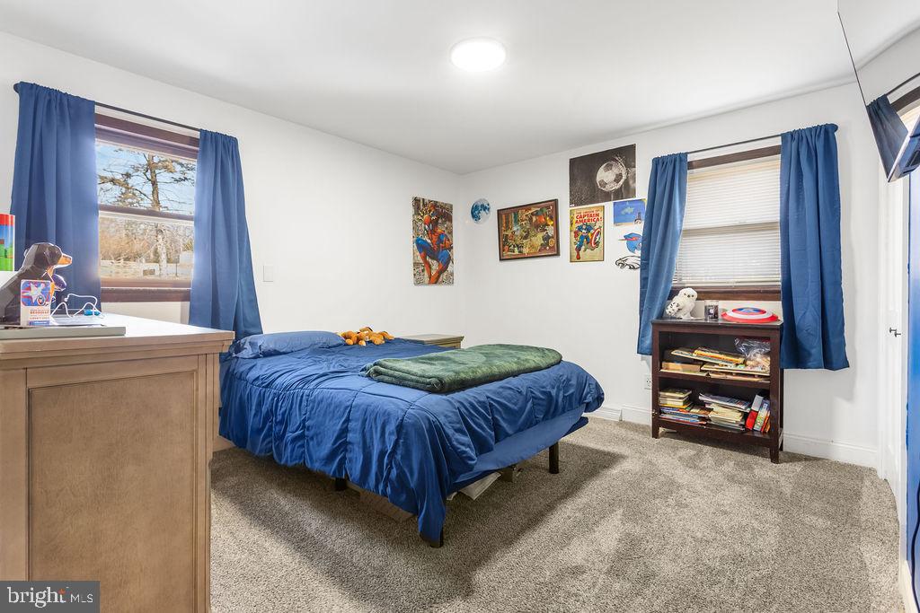 2276 Ridge Road York, PA 17406 - Photo 17 of 34 a bedroom with a bed and a dresser