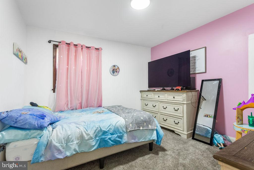 2276 Ridge Road York, PA 17406 - Photo 19 of 34 a bedroom with a bed and furniture