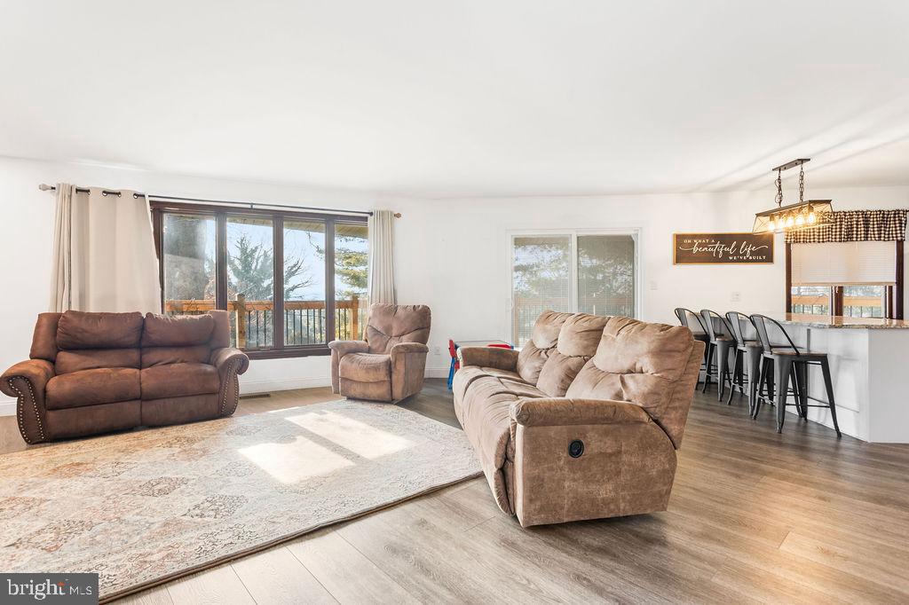 2276 Ridge Road York, PA 17406 - Photo 4 of 34 a living room with furniture and a wooden floor