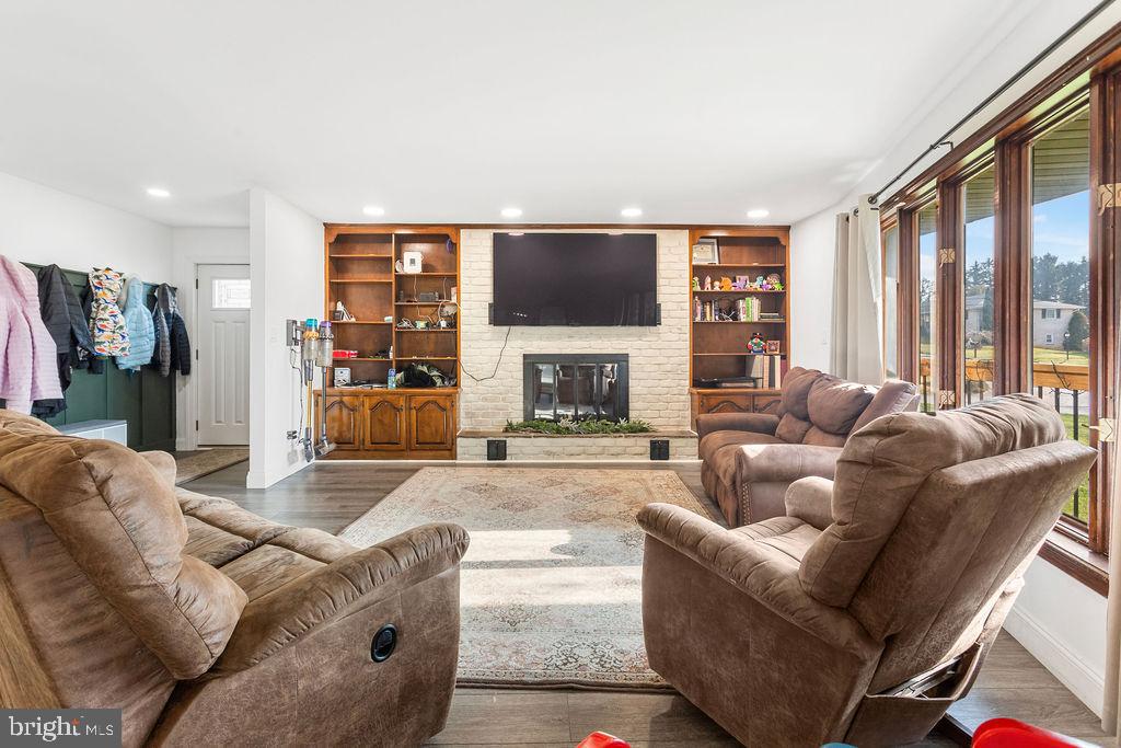 2276 Ridge Road York, PA 17406 - Photo 5 of 34 a living room with fireplace furniture and a flat screen tv