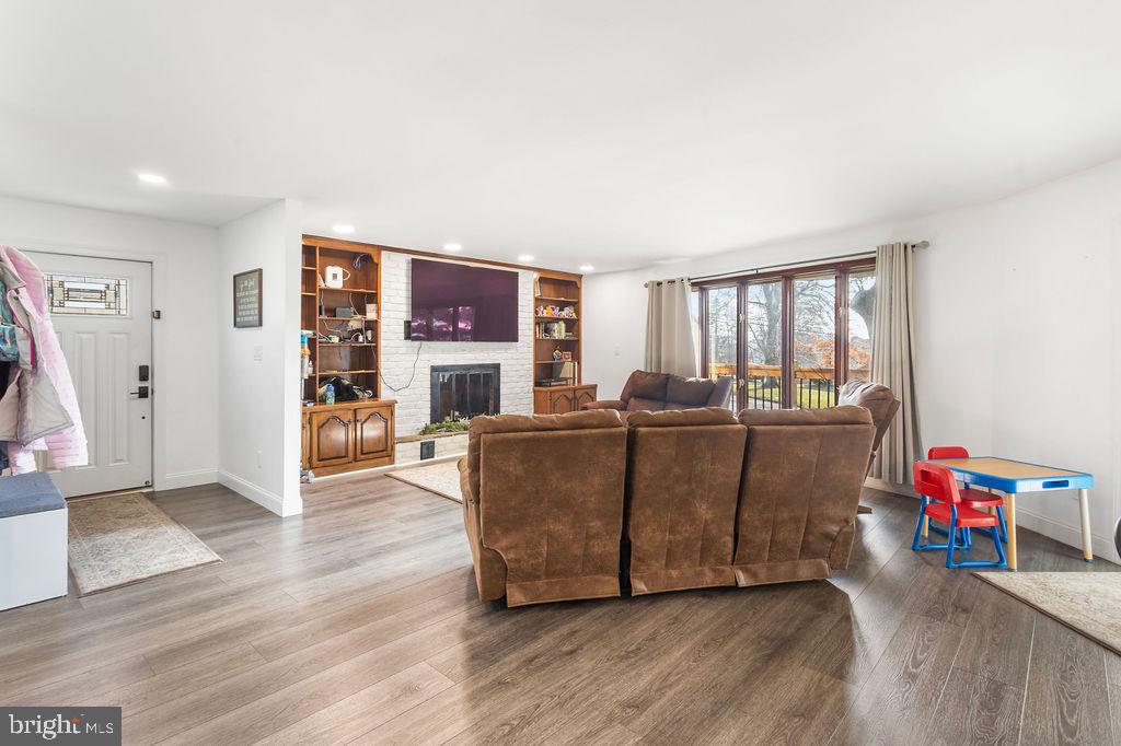 2276 Ridge Road York, PA 17406 - Photo 9 of 34 a living room with furniture and a wooden floor