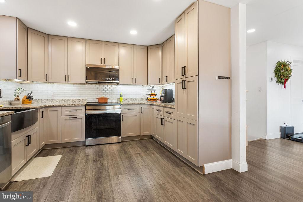 2276 Ridge Road York, PA 17406 - Photo 10 of 34 a kitchen with white cabinets and white appliances