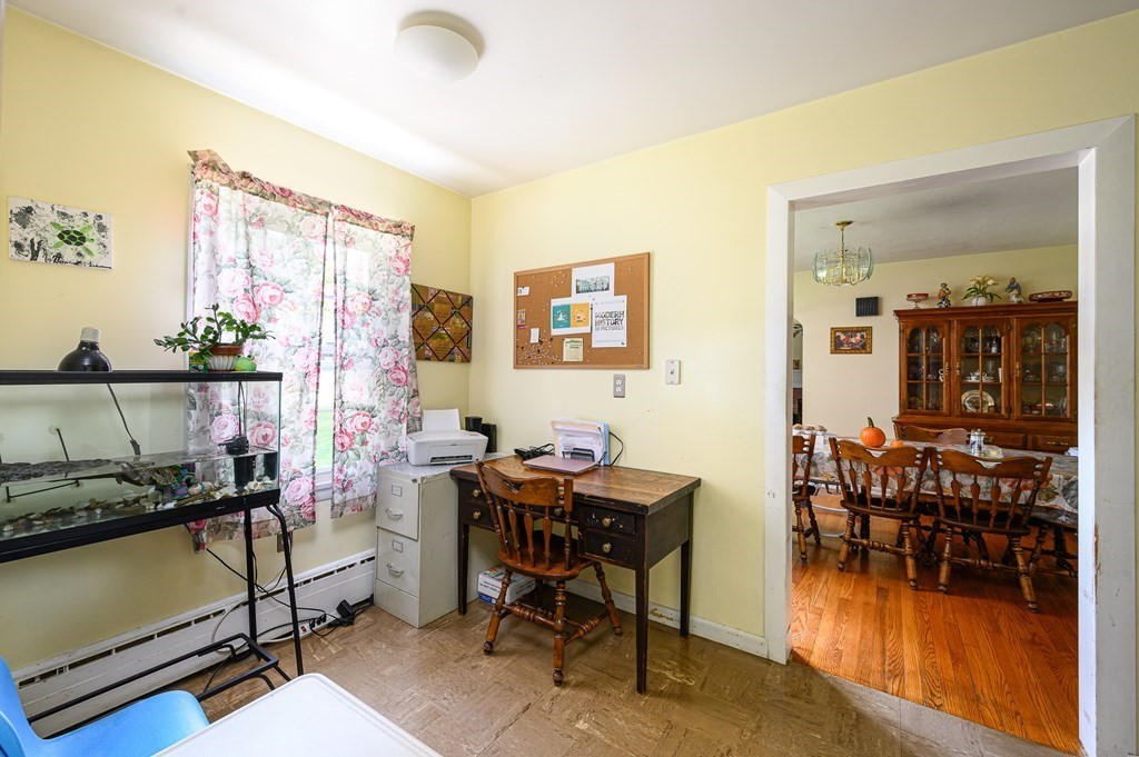 627 Pleasant Street Athol, MA 01331 - Photo 12 of 16 a dining room with furniture and window