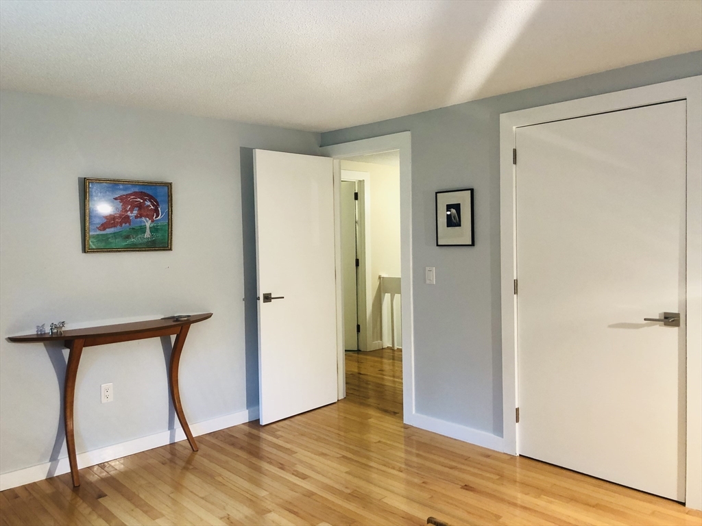 99 Lacy Road Jaffrey, NH 03452 - Photo 20 of 29 a view of a hallway with wooden floor and closet