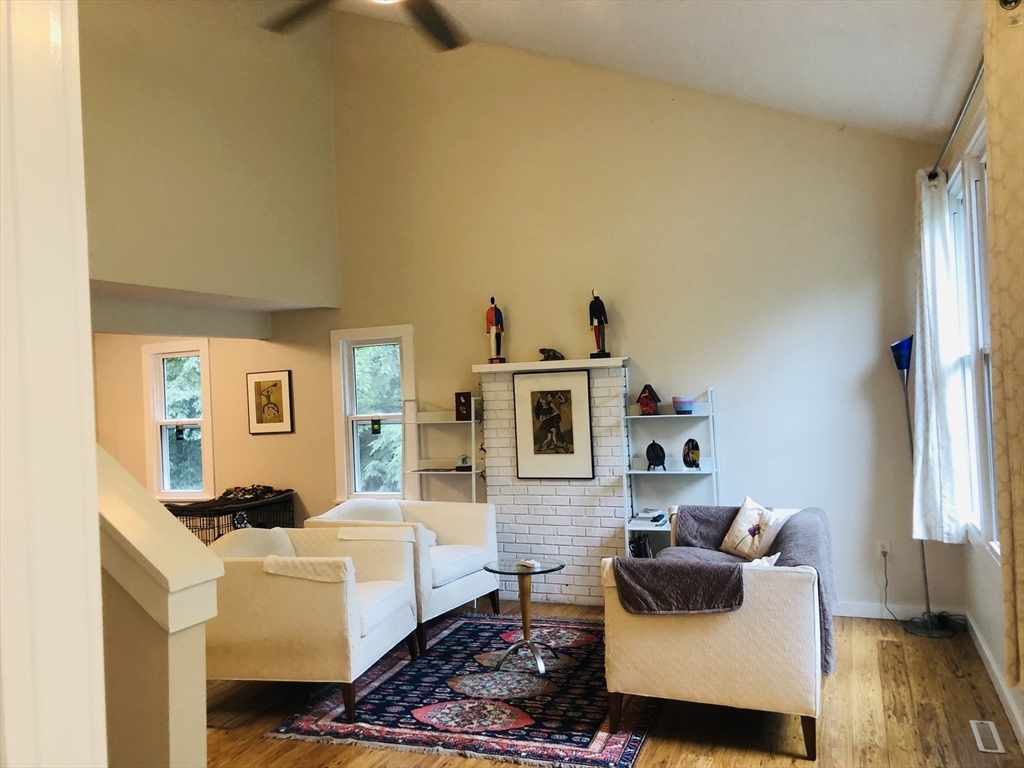 99 Lacy Road Jaffrey, NH 03452 - Photo 3 of 29 a living room with furniture and a flat screen tv