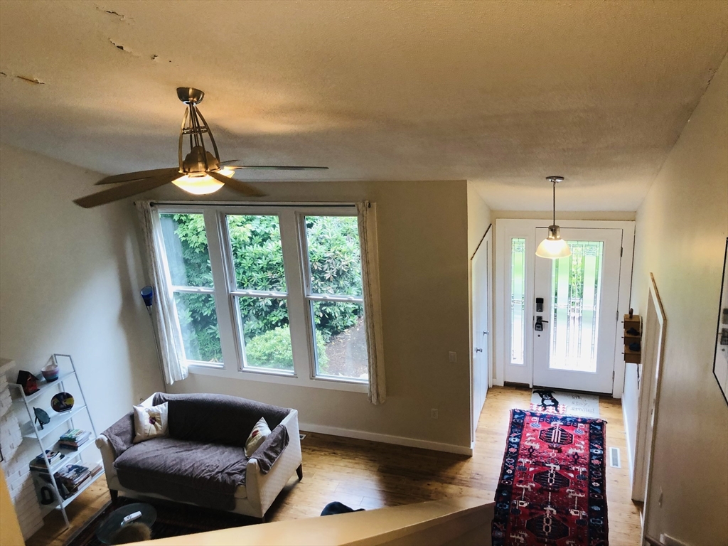 99 Lacy Road Jaffrey, NH 03452 - Photo 4 of 29 a living room with furniture and a window