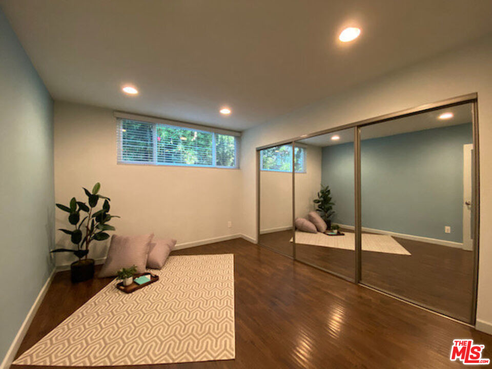 1920 Hillcrest Road, Unit 5 Los Angeles, CA 90068 - Photo 11 of 17 a hallway with a view of living room