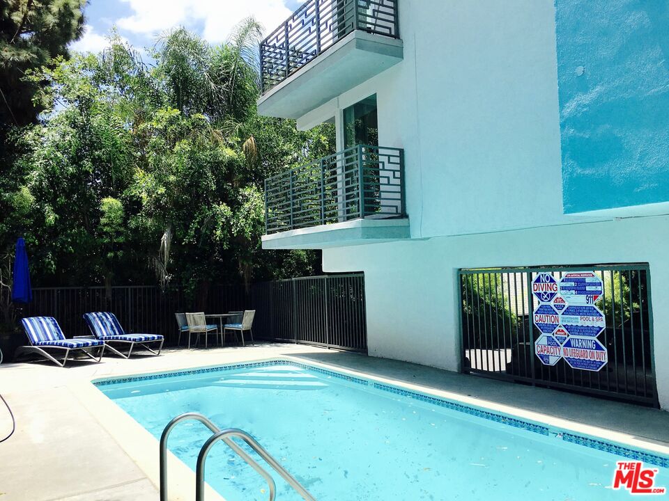1920 Hillcrest Road, Unit 5 Los Angeles, CA 90068 - Photo 17 of 17 a view of swimming pool with furniture