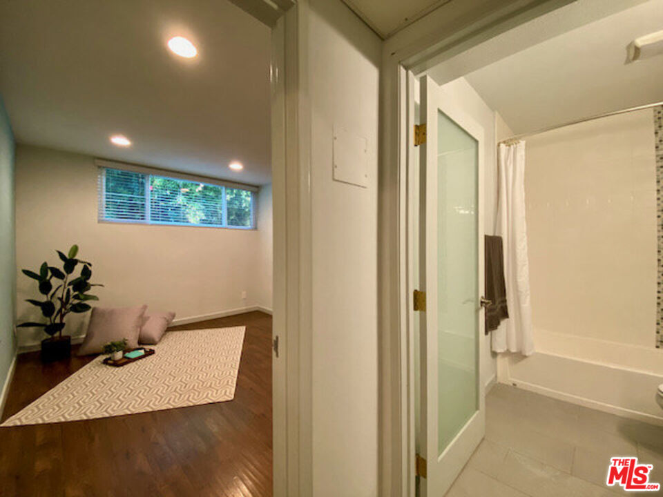 1920 Hillcrest Road, Unit 5 Los Angeles, CA 90068 - Photo 10 of 17 a view of a hallway with workspace