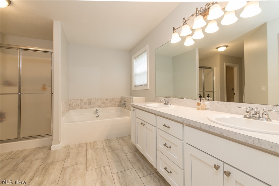 1049 Lander Road Cleveland, OH 44143 - Photo 20 of 35 Updated Master Bath - new cabinets, flooring, sinks, fixtures...
