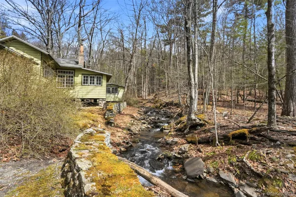 a view of a backyard of the house