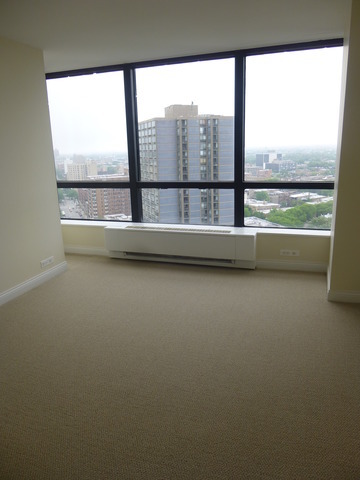 5415 North Sheridan Road, Unit 2311 Chicago, IL 60640 - Photo 7 of 18 a view of lot of an ocean from a window