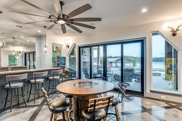 a view of a dining room with furniture window and outside view