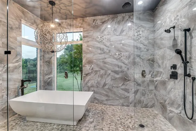 a white bath tub sitting in a bathroom