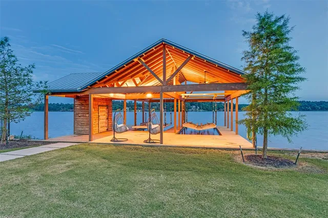 a view of a patio with couches and potted plants