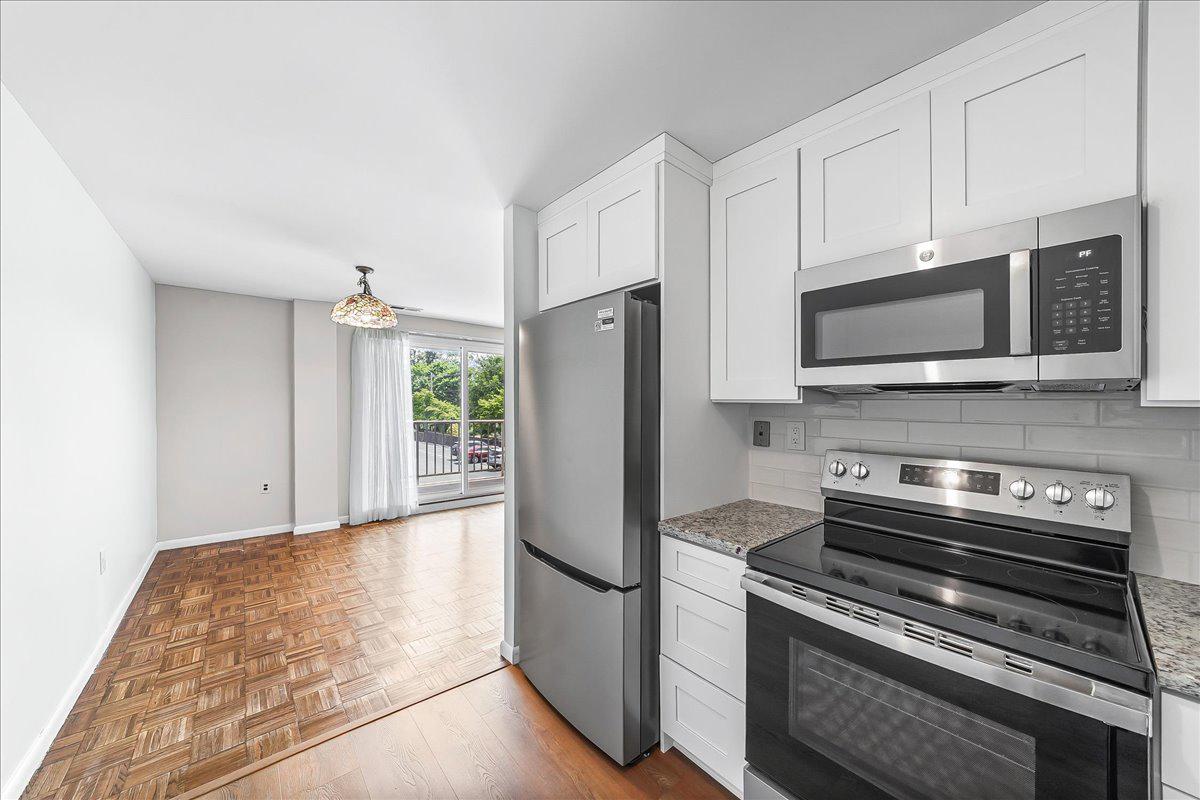 501 North Providence Road, Unit 213 Media, PA 19063 - Photo 3 of 30 Modern Kitchen with Granite Counters
