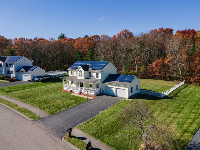 an aerial view of a house with garden