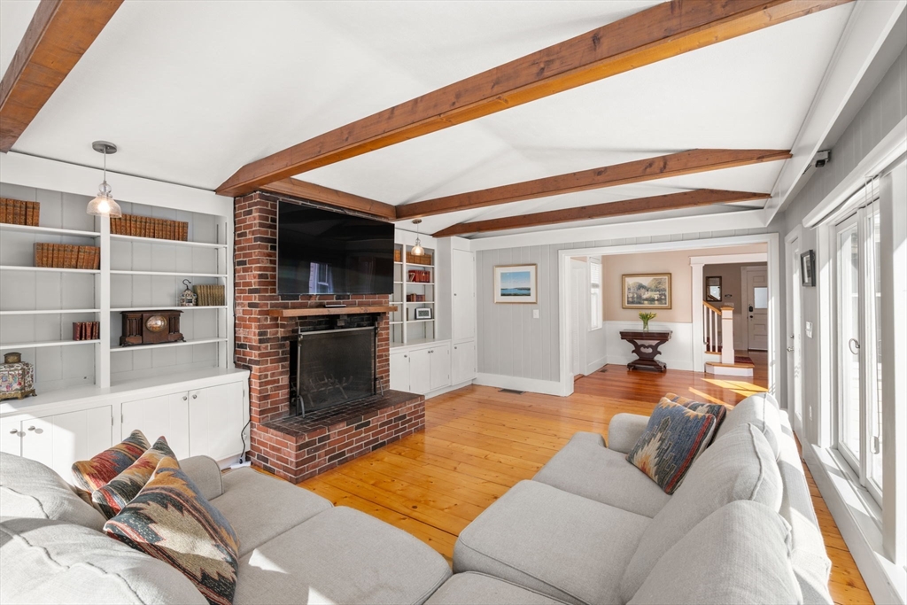 2 Old Sudbury Road Wayland, MA 01778 - Photo 13 of 40 a living room with furniture and a flat screen tv