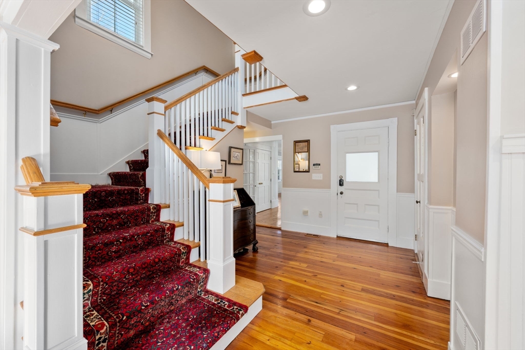 2 Old Sudbury Road Wayland, MA 01778 - Photo 15 of 40 a view of entryway and hall with wooden floor