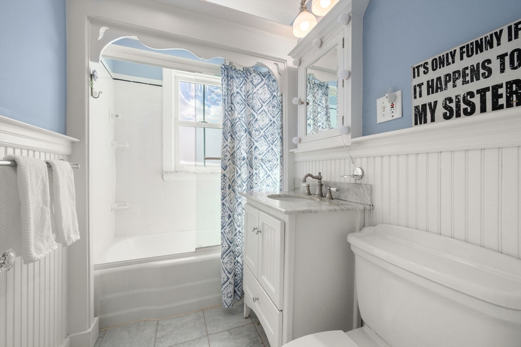 2 Old Sudbury Road Wayland, MA 01778 - Photo 24 of 40 a bathroom with a granite countertop sink a toilet and shower
